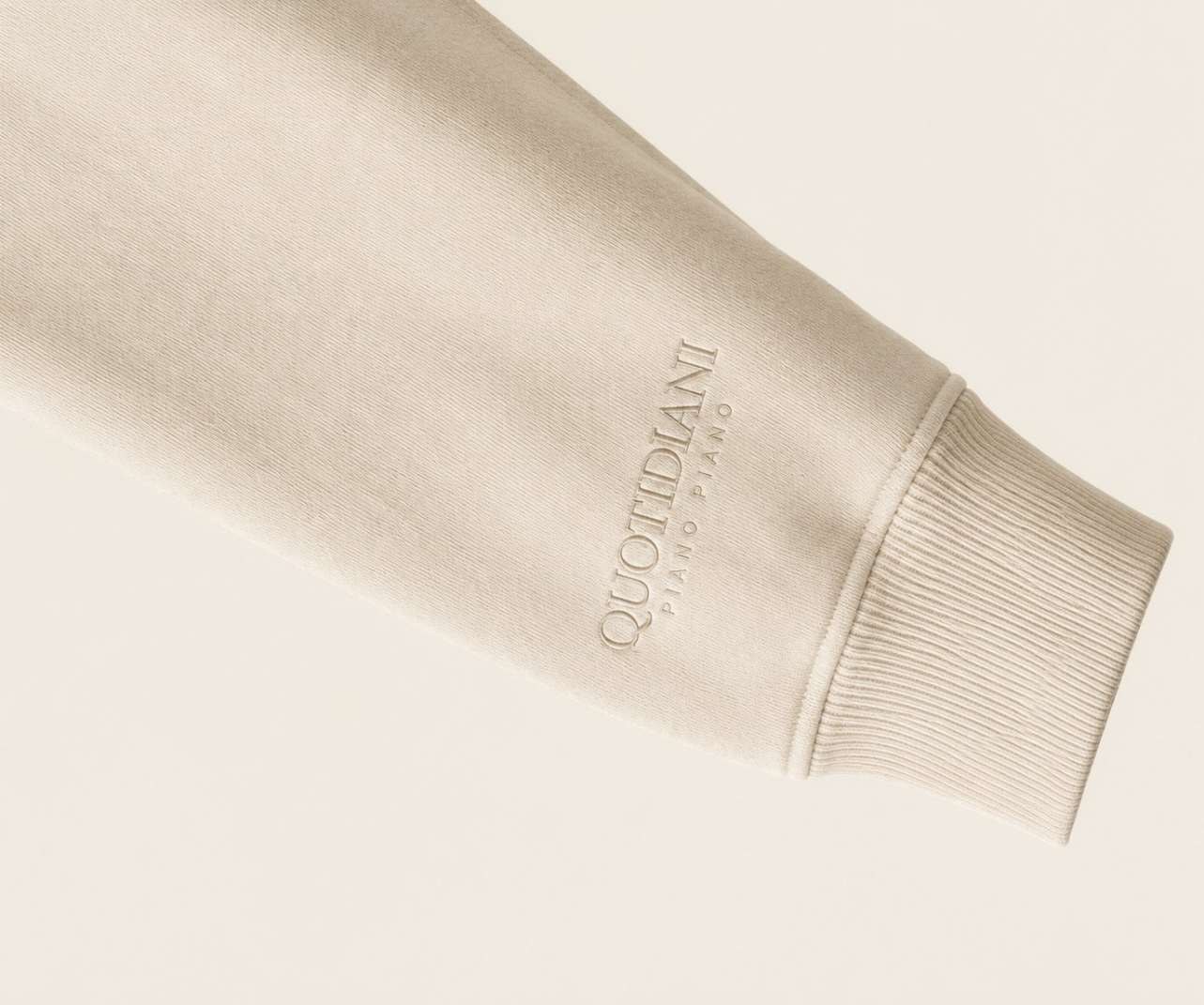 Right sleeve wordmark and cuff